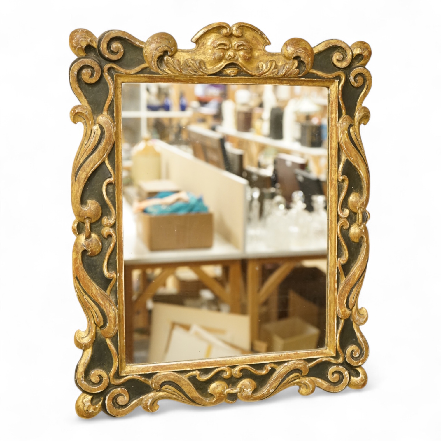 A 19th century parcel-gilt mirror, 53cm high